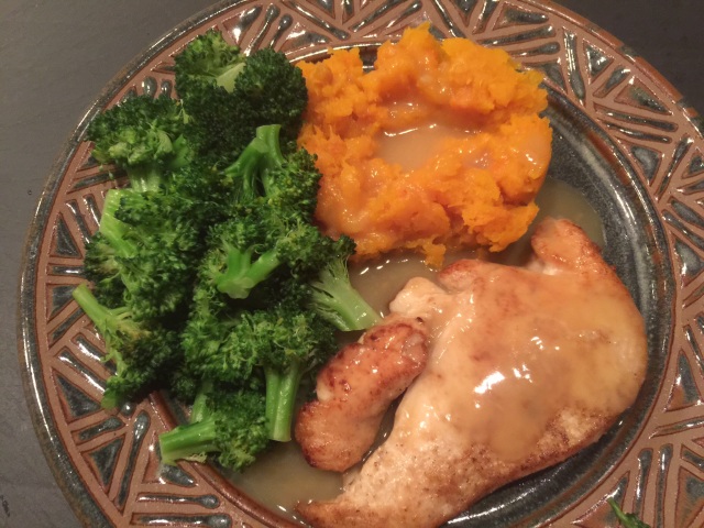 Pan-roasted chicken breast with butternut squash, broccoli, and gravy